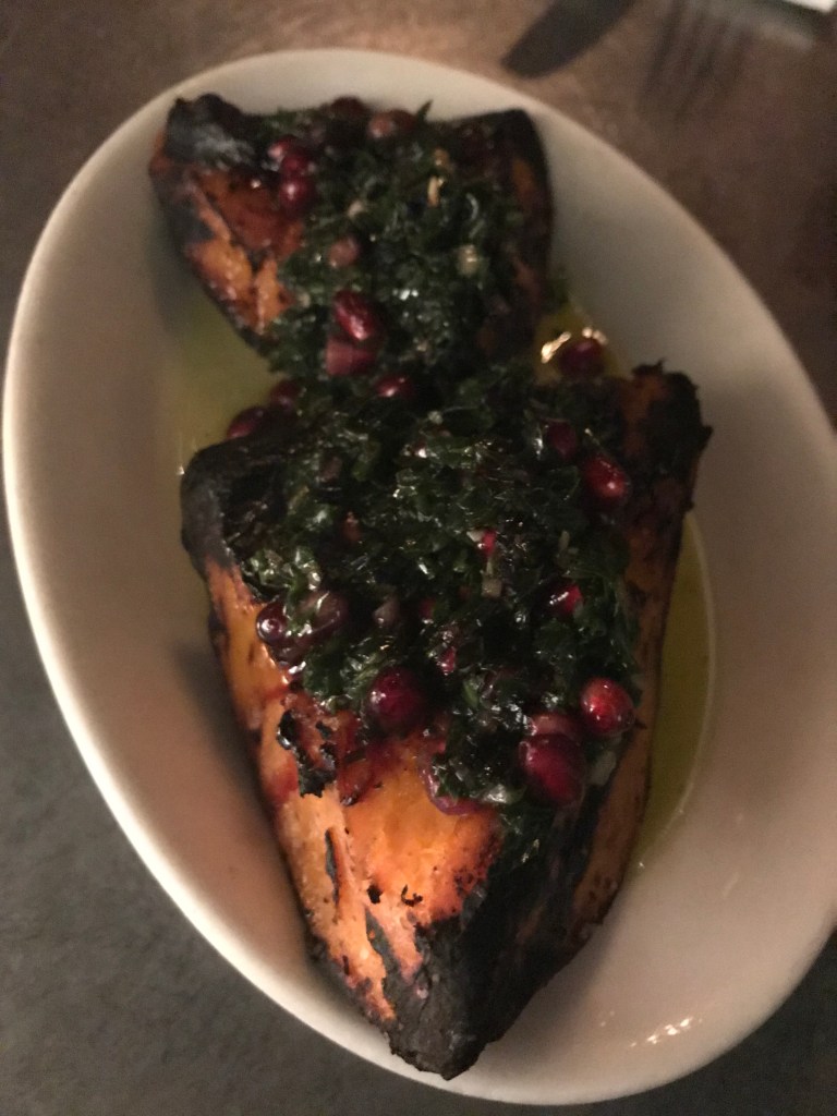 grilled orange kabocha squash, pomegranate arils, mint pesto
